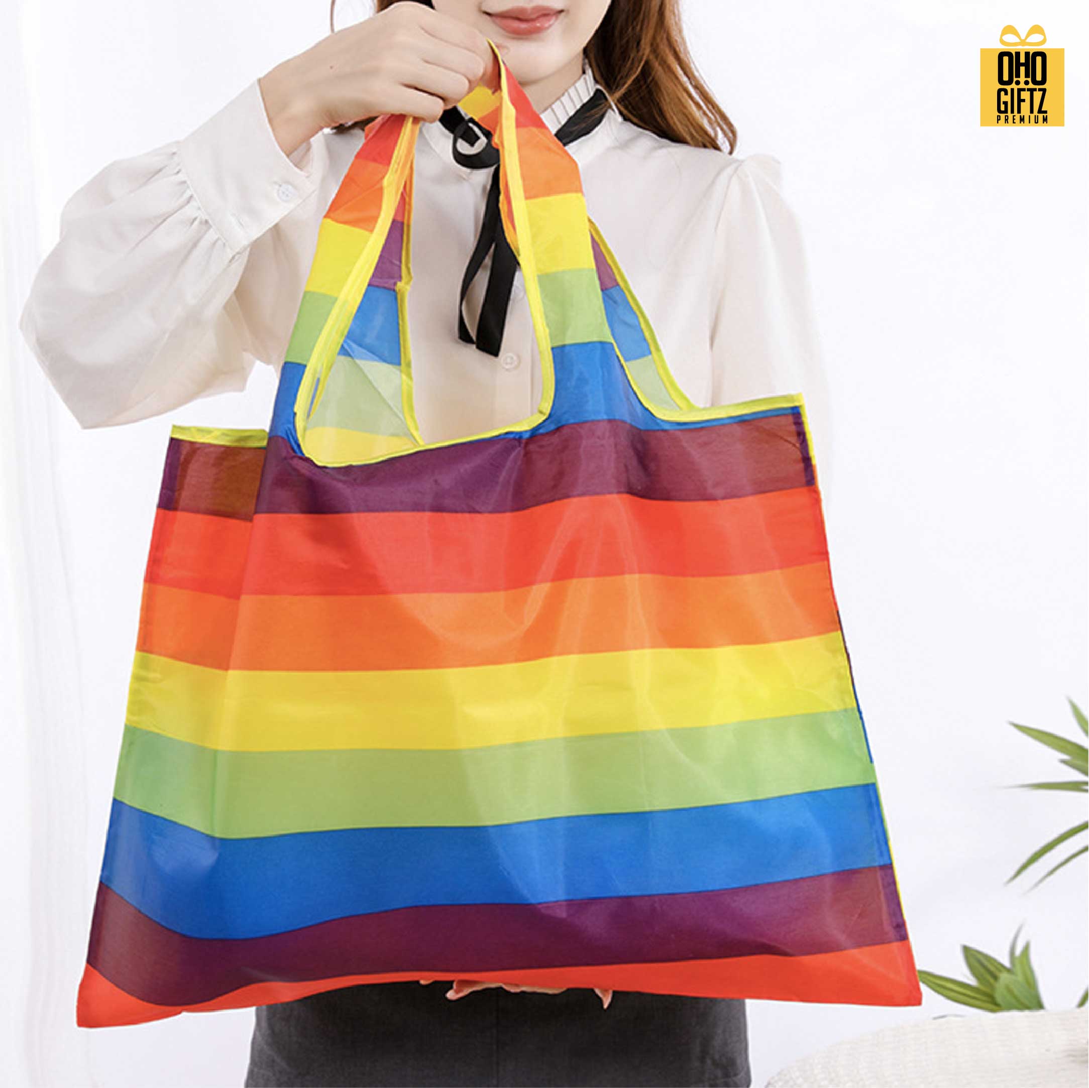กระเป๋าพับได้ลายสายรุ้ง สกรีนโลโก้ ทำเป็นของพรีเมี่ยม ของที่ระลึกได้